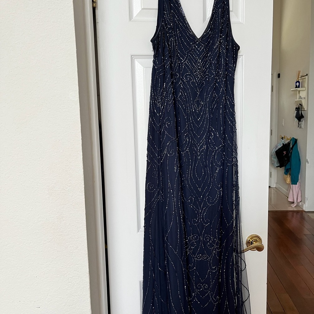 Floor length beaded dark blue dress by BHLDN